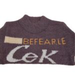 ⁦بلوزة صوف للأطفال لون بنفسجي وبيج⁩ - الصورة ⁦2⁩