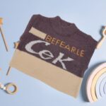 ⁦بلوزة صوف للأطفال لون بنفسجي وبيج⁩ - الصورة ⁦4⁩