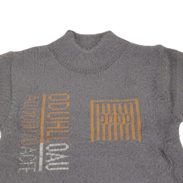 ⁦بلوزة صوف للأطفال لون سكني⁩ - الصورة ⁦6⁩