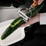 ⁦قشارة ستانلس يد خشبية⁩ - الصورة ⁦3⁩