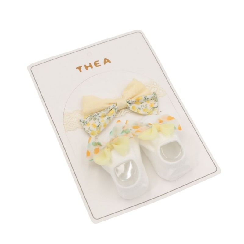 ⁦طقم للأطفال قطعتين لون أبيض و أصفر⁩ - الصورة ⁦1⁩