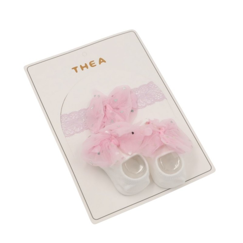 ⁦طقم للأطفال قطعتين لون أبيض و زهري⁩ - الصورة ⁦1⁩