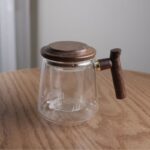 إبريق شاي زجاجي للأعشاب مع مقبض خشبي 650 مل