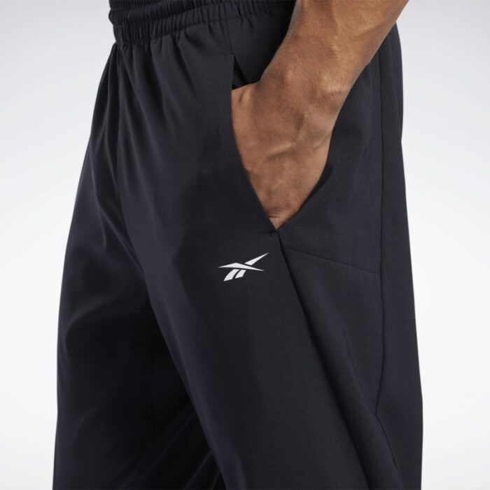 ⁦بنطلون ريبوك وورك ريدي ترك للرجال لون أسود - Reebok Men's Workout Ready Track Pants – Black⁩ - الصورة ⁦4⁩