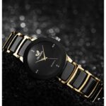 ⁦ساعة معدنيه دائرة صغيرة ذهبي و اسود⁩ - الصورة ⁦2⁩