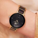 ⁦ساعة معدنيه دائرة صغيرة ذهبي و اسود⁩ - الصورة ⁦3⁩