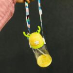 ⁦مطرة ماء قرون مع حبل لون أصفر⁩ - الصورة ⁦4⁩