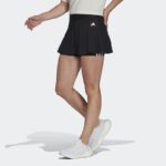 adidas Women's Training Essentials 3 Stripes Skirt- تنوره رياضية اديداس ايسينشيال ثلاث خطوط للنساء لون أسود