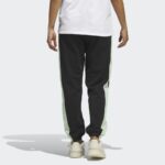 ⁦بنطلون اديداس كوفد تاب للنساء لون أسود-adidas Womens' Cuffed Tape Joggers - Black⁩ - الصورة ⁦4⁩