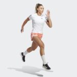 ⁦شورت اديداس ماراثون 20 للنساء لون برتقالي- adidas Womens' Marathon 20 Running Shorts - Orange⁩ - الصورة ⁦4⁩