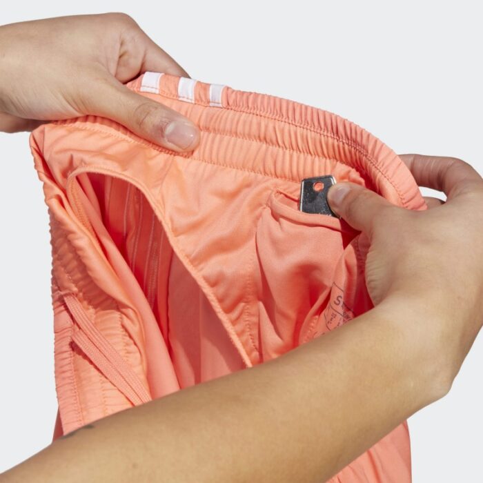 ⁦شورت اديداس ماراثون 20 للنساء لون برتقالي- adidas Womens' Marathon 20 Running Shorts - Orange⁩ - الصورة ⁦7⁩
