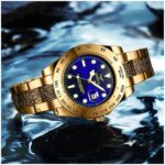 ساعة يد عقارب حزام سيلكون لون ذهبي