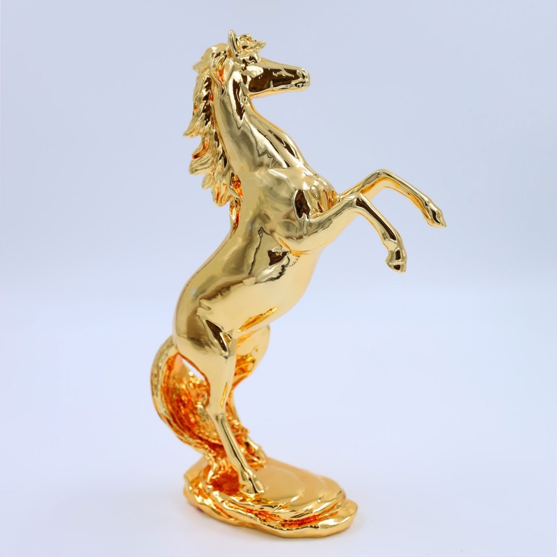 ⁦تحفة بتصميم حصان 28 سم لون ذهبي⁩ - الصورة ⁦1⁩