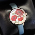 ساعة جلد ستاتية بتصميم مينا ورد من Nafisa عقارب لون فستقي