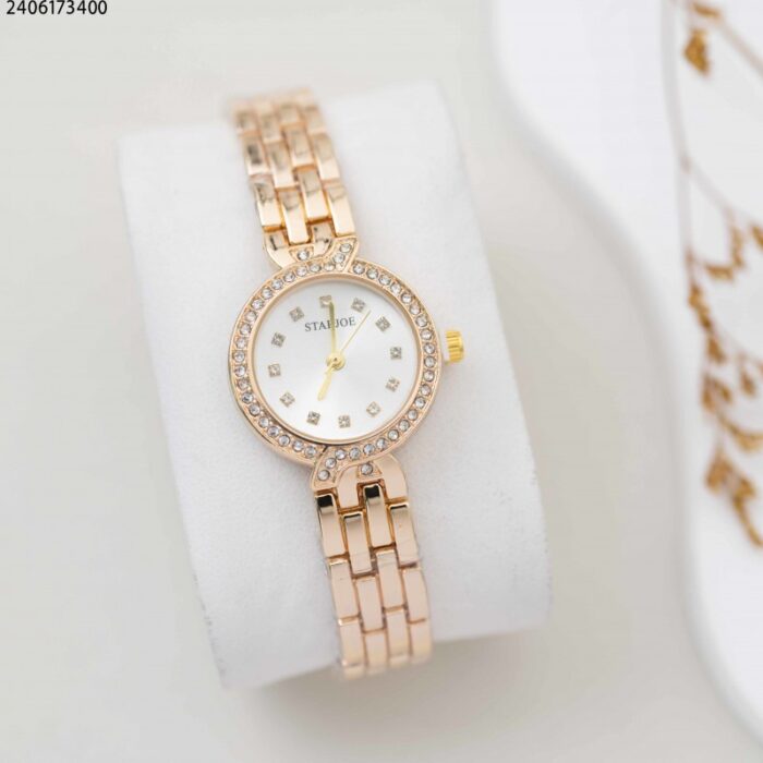 103380133_67fadd2d9a1f2 ساعة نسائي دائرة زركون ارضية كحلي ستوريج لون ذهبي وكحلي - الصورة 1