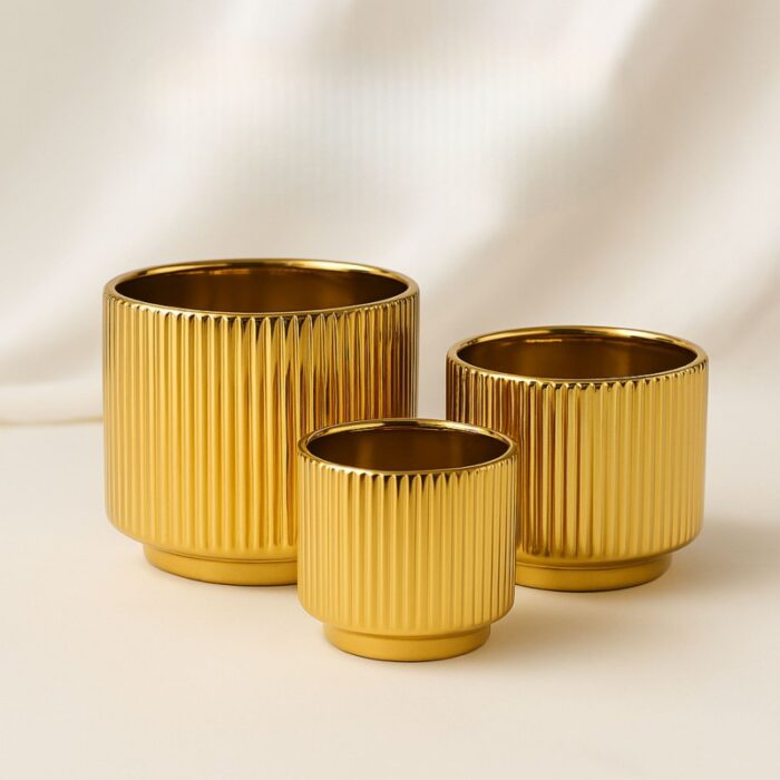 103380904_67fa6385ecf4a طقم قوار ورد بورسلان فاخر 3 قطع مخطط بالطول لون ذهبي - الصورة 1