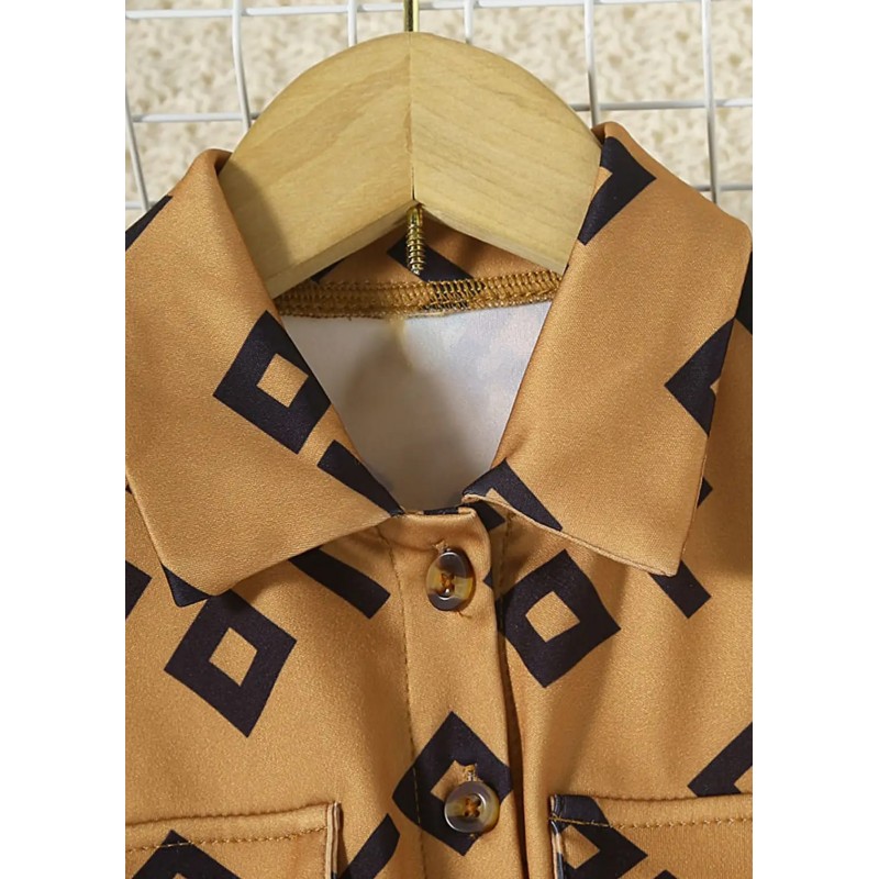 ⁦فستان جلد بناتي لون بني و أسود⁩ - الصورة ⁦1⁩