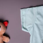 طقم قطعتين تيشيرت وشورت للأطفال لون فيروزي وكحلي