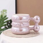 ⁦مج (كوب ) مع مقبض لون بنفسجي بتصميم good time⁩ - الصورة ⁦2⁩