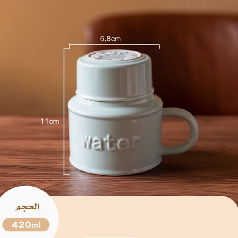 ⁦مج (كوب ) مع غطاء لون فيروزي⁩ - الصورة ⁦1⁩