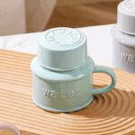 ⁦مج (كوب ) مع غطاء لون فيروزي⁩ - الصورة ⁦13⁩