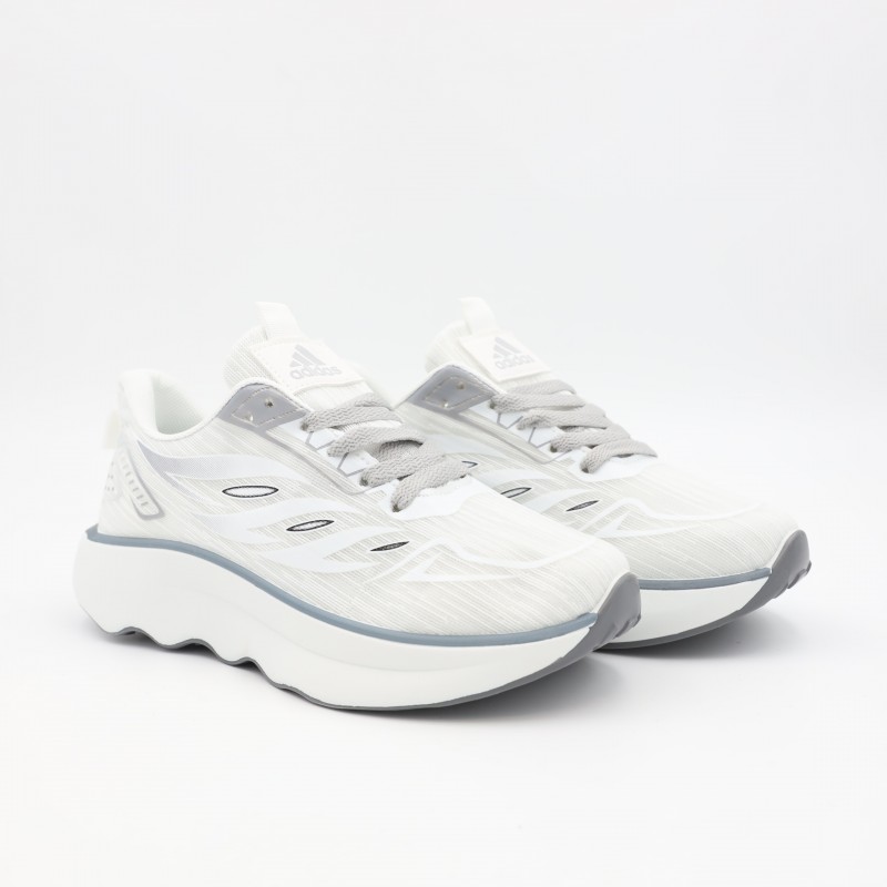 ⁦حذاء رياضي للجنسين لون أبيض ورمادي⁩ - الصورة ⁦1⁩