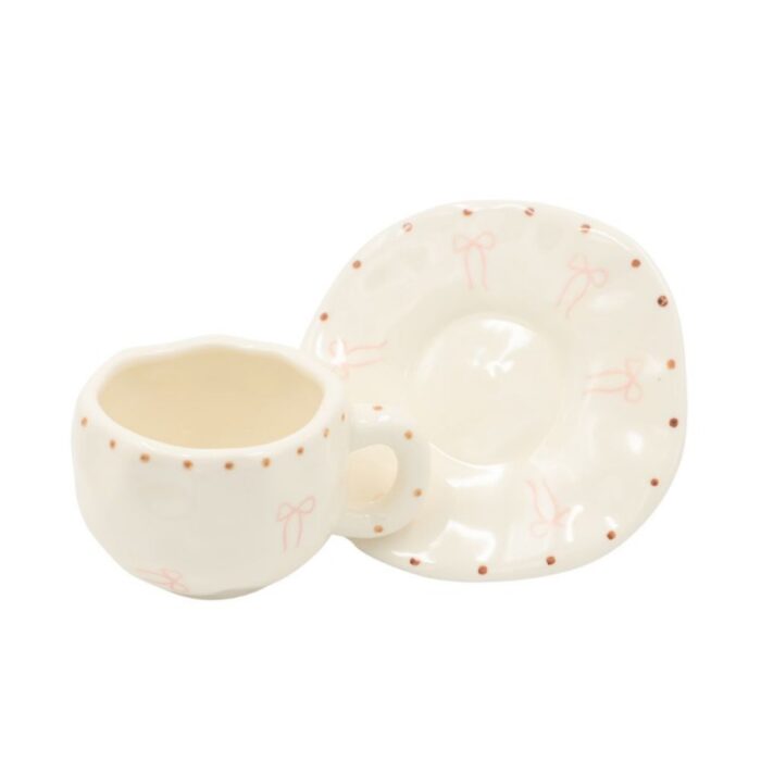 ⁦فنجان مع صحن لون أبيض بتصميم ببيونة⁩ - الصورة ⁦7⁩