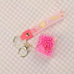 ⁦ميدالية بتصميم شنتة خرز - حسب اللون المتوفر⁩ - الصورة ⁦2⁩