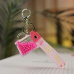 ⁦ميدالية بتصميم شنتة خرز - حسب اللون المتوفر⁩ - الصورة ⁦4⁩