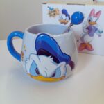 ⁦مج دزني بطوط لون أزرق⁩ - الصورة ⁦2⁩