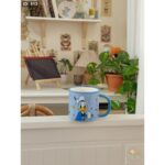 ⁦مج دزني بطوط لون أزرق⁩ - الصورة ⁦2⁩