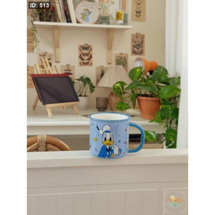 ⁦مج دزني بطوط لون أزرق⁩ - الصورة ⁦2⁩