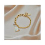 ⁦سوار ذهبي بتصميم قلب أبيض⁩ - الصورة ⁦2⁩