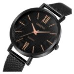 ساعة يد رجالية كوراتز من الستانلس ستيل- حزام شبكي لون أسود وعقارب باللون البرونزي