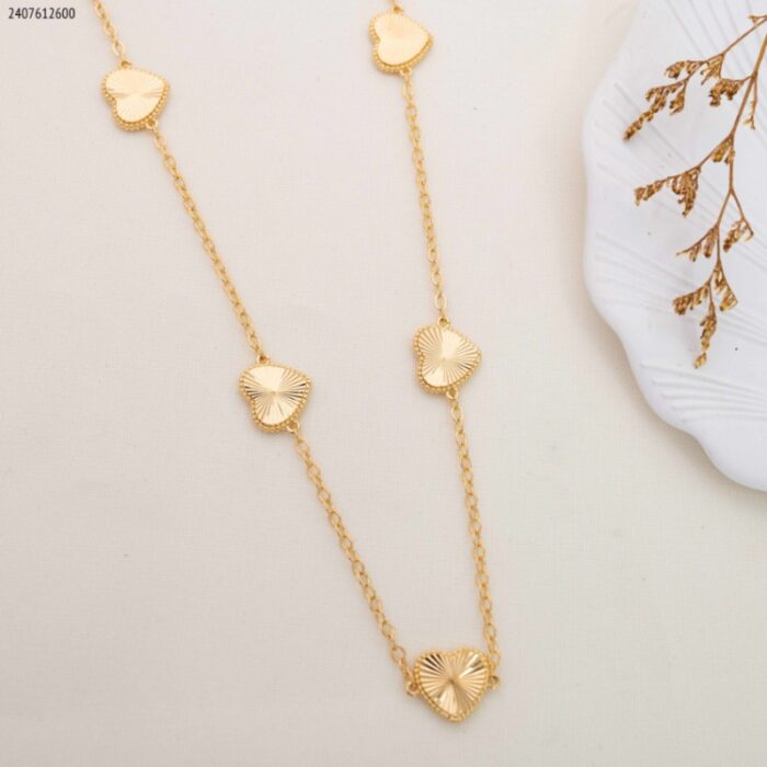 103383687_685ebe6c04514 سلسال قلوب خمس تعليقات لون ذهبي - الصورة 1