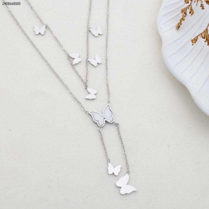 103383766_685ebecea4e64 سلسال طبقتين فراشات لون فضي - الصورة 1