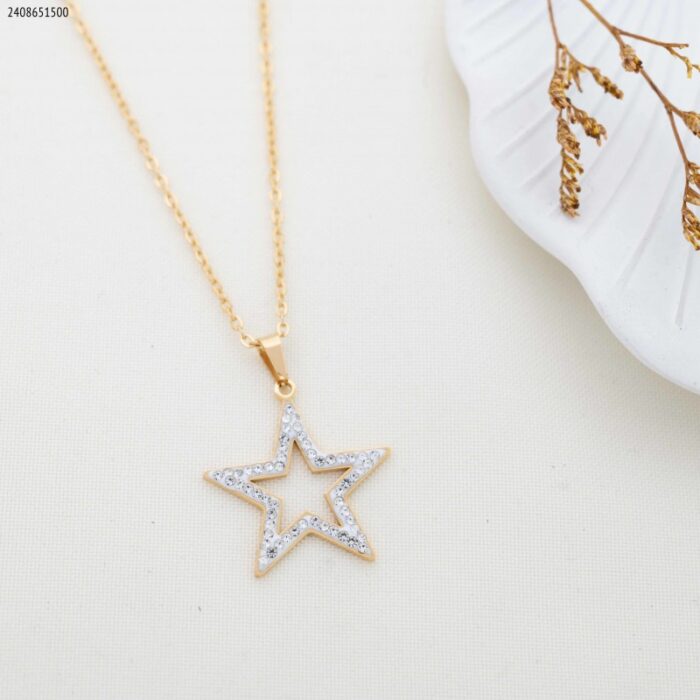 103383808_685ebf0ce20f0 سلسال نجمة كبيرة فارغة اطارين لون ذهبي - الصورة 1