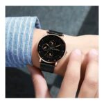 ساعة للرجال ذات حزام معدني شبكي - ماركة Geneva - لون أسود