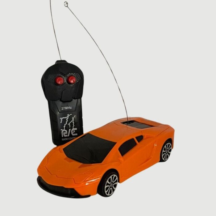 103384190_685ec3797daac لعبة سيارة بطاريات لون برتقالي - الصورة 1