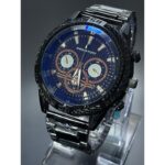 ساعة معدنية للرجال لون أسود أرضية زرقاء ماركة awin sport