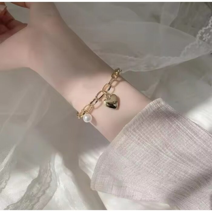 103384815_685ec91c9a2c0 سوار لون روزجولد مع لولو - الصورة 1