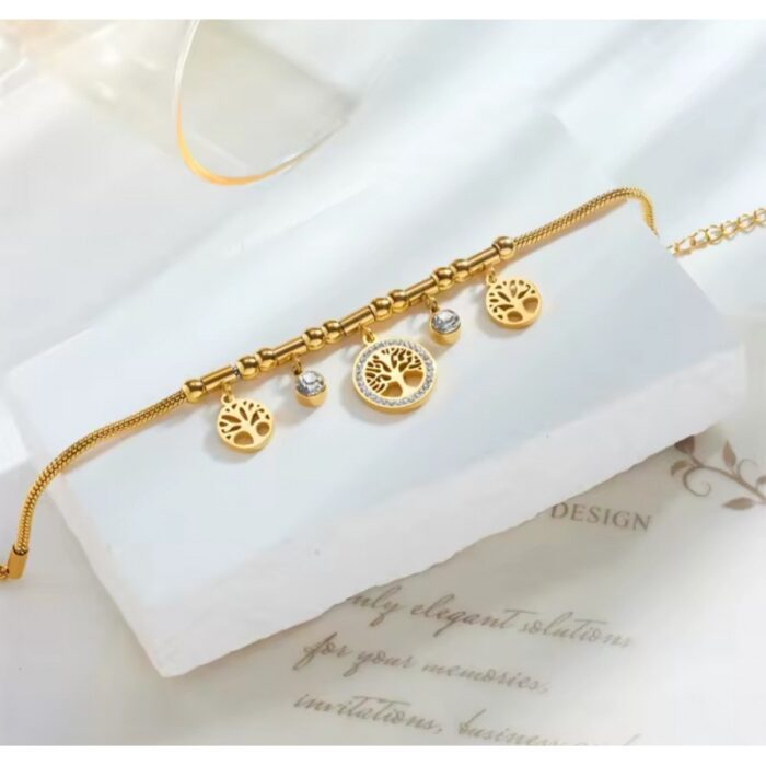 ⁦سوار بشعار شجرة لون ذهبي⁩ - الصورة ⁦3⁩