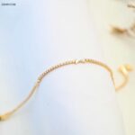 سوار مع زركون أبيض لون ذهبي