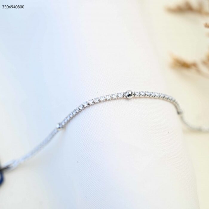 103385007_685ecc1f25159 سوار بتصميم زركون مربعات صغيرة لون فضي - الصورة 1