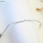 سوار بتصميم زركون أبيض مع نجوم لون فضي