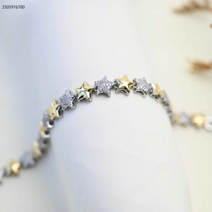 103385037_685ecc7339921 سوار بتصميم نجوم (اللون: فضي و ذهبي) - الصورة 1