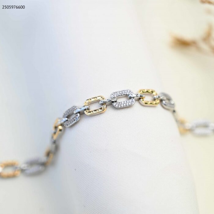 103385043_685ecc7b7300b سوار بتصميم حلقات (اللون: ذهبي وفضي) - الصورة 1