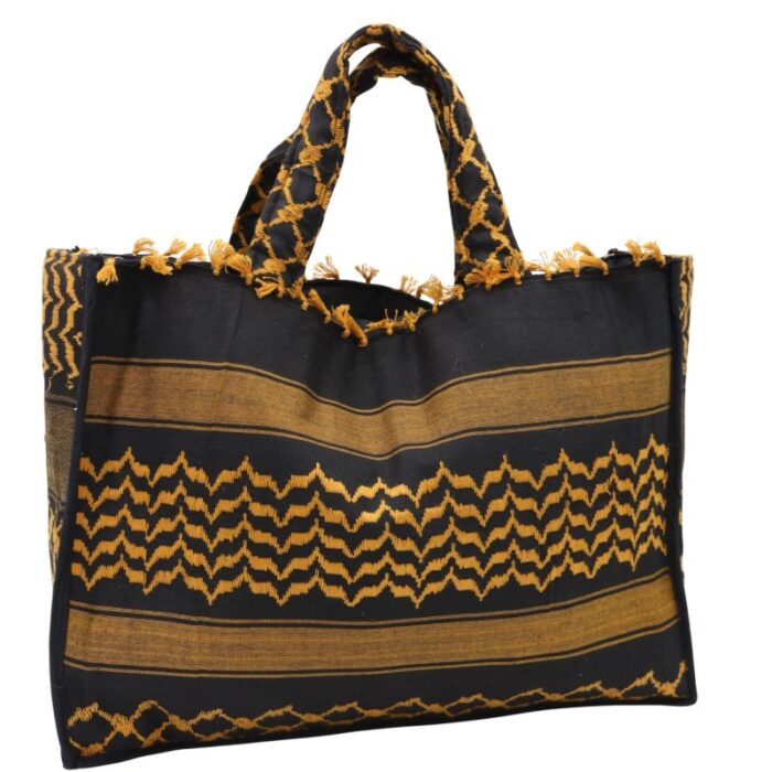 ⁦حقيبة ستاتية صناعة يدوية بتصميم كوفية لون أسود و أصفر⁩ - الصورة ⁦2⁩