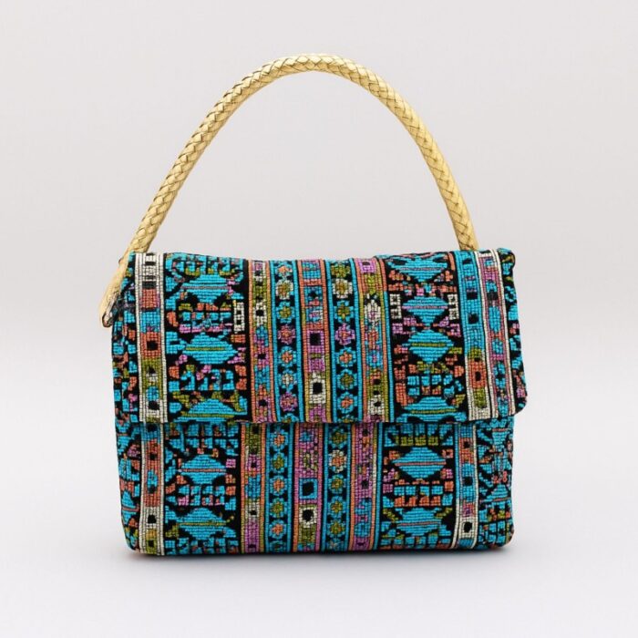 103385337_685ecf617d160 حقيبة ستاتية صناعة يدوية مطرزة بتصميم أنيق لون أزرق - الصورة 1