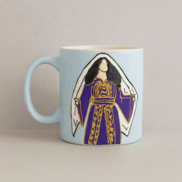 103385463_686359a77512b مج بتصميم تراثي زي فلسطيني حجم 250 مل لون أزرق سماوي ( رسم يدوي ) - الصورة 1